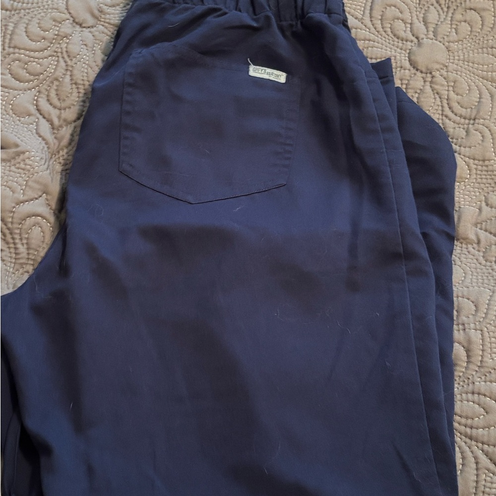 Grey’s Anatomy navy blue scrub pants.  Size medium.